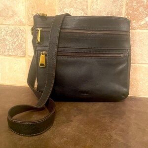 Fossil leather crossbody, two zippers outside, inside zipper and 2 slit slots